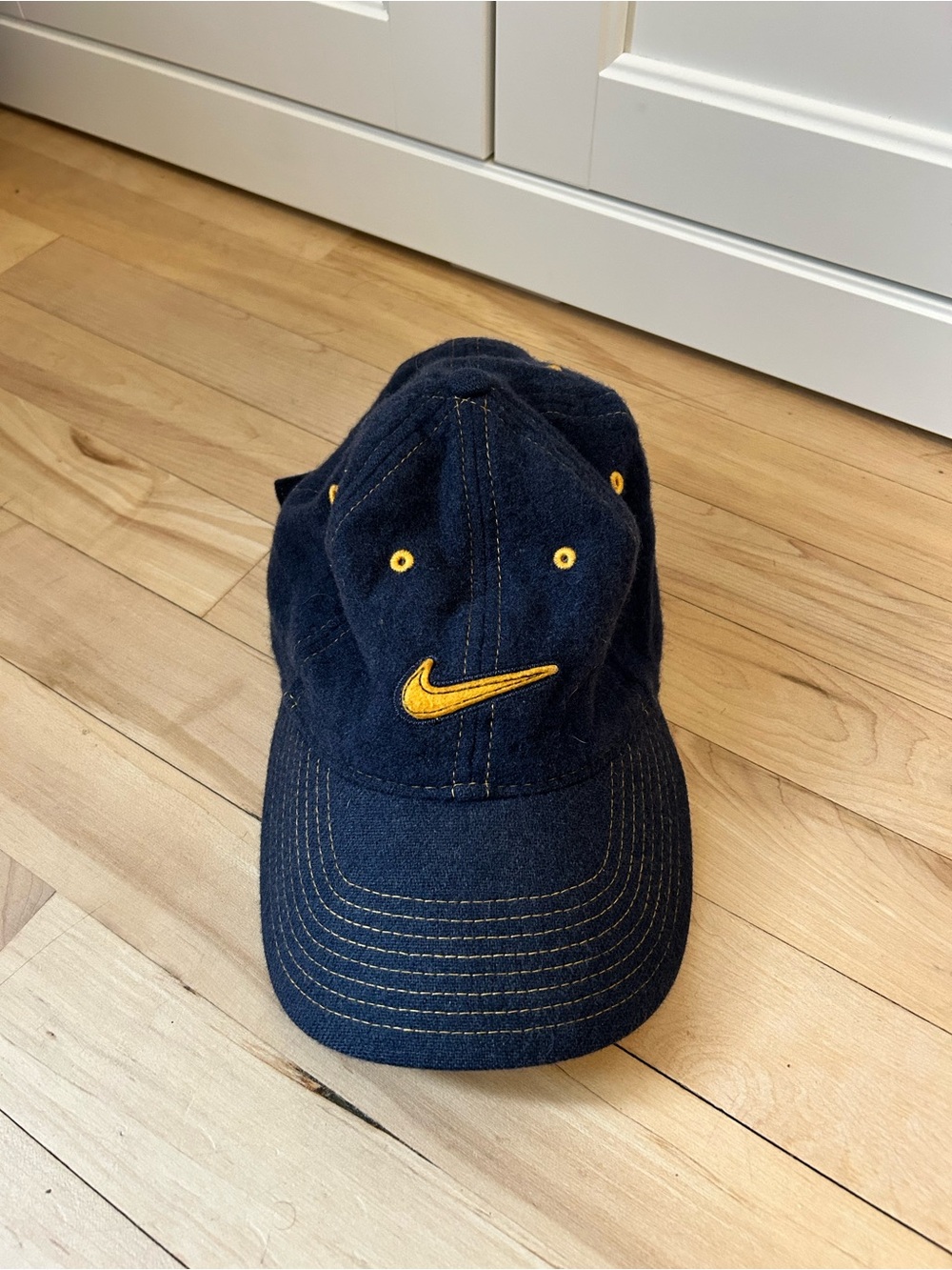 Vintage Nike Dark Blue Cap with Yellow Swoosh